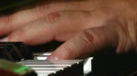 Man play piano, side view Видео 12665840
