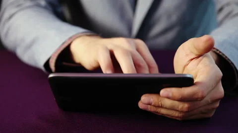 Man play on tablet Stock Footage 45785679