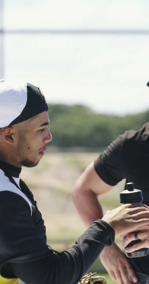 Man, player and handshake outdoor for baseball, sportsmanship and fair play with Stock Footage 336680433