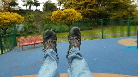 Man On Playground Swing POV 스톡 동영상 82399577