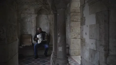 Man playing accordion alone Stock Footage 197328086