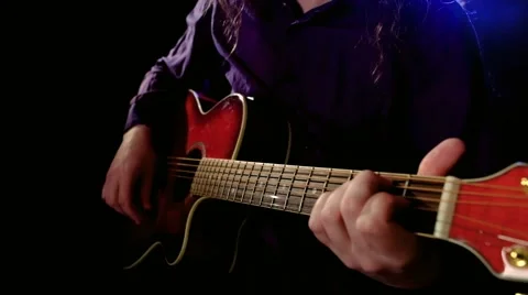 Man playing an acoustic guitar. Stock Footage 60123341