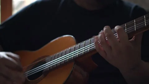 A Man Playing An Acustic Guitar Stock Footage 152260601