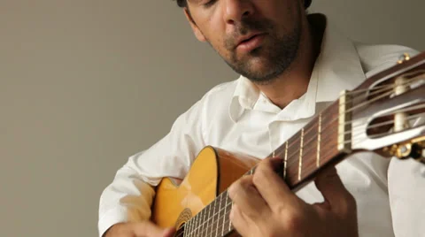 Man playing and singing Stock Footage 29467613