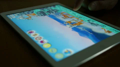 Man playing angry birds on a Tablet PC Video stock 47761337