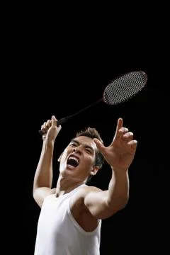 Man playing badminton Stock Photos