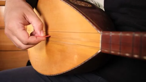 Man playing baglama Stock Footage 208881536