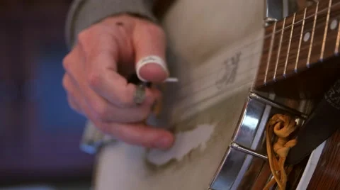 Man playing the banjo in a band close up Stock Footage