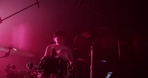 Man playing beat on drums Stock Footage 249853136