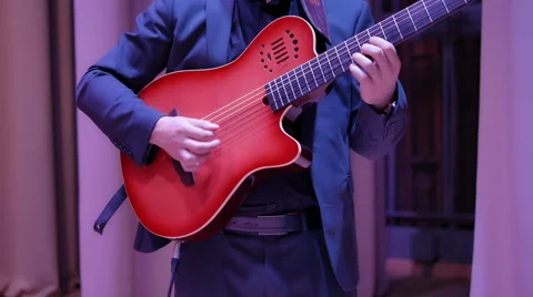 Man Playing on Beautiful Custom Guitar 4K Vidéo 61643592