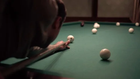 Man playing billiards Stock Footage 98450646