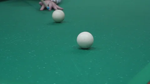 The man playing billiards hit the ball badly and did not hit the pocket Stock Footage 103119156