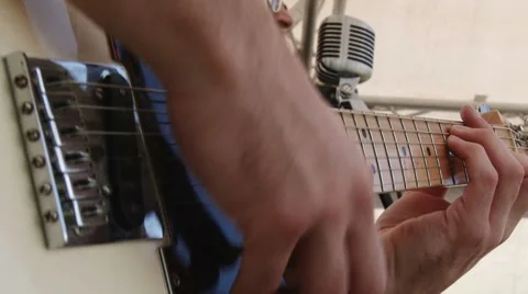 Man playing black white electric guitar, retro Stock Footage 7738752