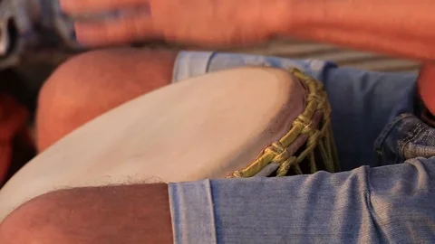 Man playing on Bongo drum close up. Drums hands, movement, rhythm. Goa, India Stock Footage 76974849
