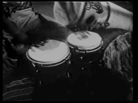 Man playing bongo drums Stock Footage 260251239