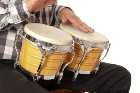 Man playing bongo on his lap Stock Photos