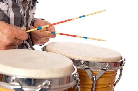 Man playing bongo with sticks Stock Photos