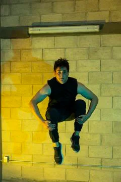 Man playing breakdance in a cellar Foto stock