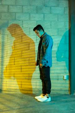 Man playing breakdance in a cellar Stock Photos
