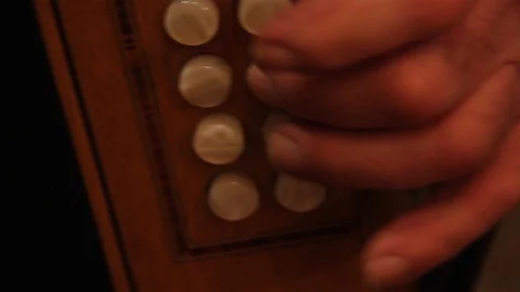 Man playing button accordion close up Stock Footage 112088438