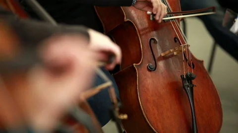 Man playing the cello. Bowed string instrument in the orchestra. Stock Footage 46743366