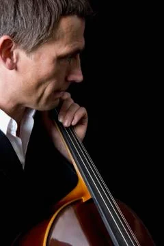 Man playing a cello Stock Photos