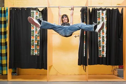 Man playing in changing room Stock Photos