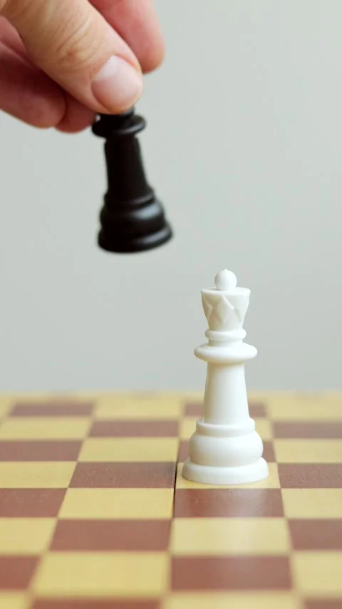 Man playing chess defeating his opponent. Political victory. Vertical video. Stock Footage 321071826