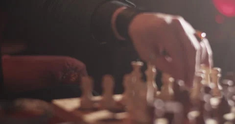 Man playing chess game in dark room at home Stock Footage 260559290