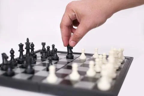 Man is playing chess Stock Photos