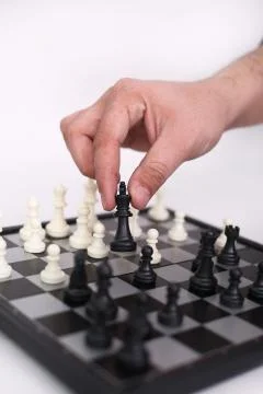 Man is playing chess Stock Photos