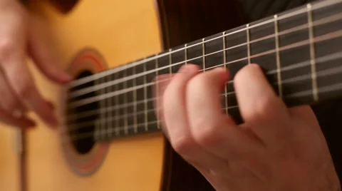 Man playing classic guitar Stock Footage 41610767