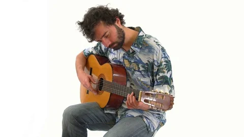 Man Playing Classical Guitar and Practicing Isolated on White Background Stock Footage 76517501