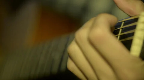 Man playing classical guitar 库存影片 32502325