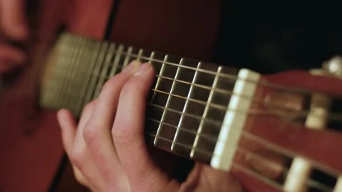 Man playing on the classical guitar with nylon strings. Video stock 149739050