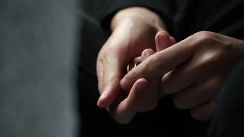 Man playing with coins - Close Up Stock Footage 237205841
