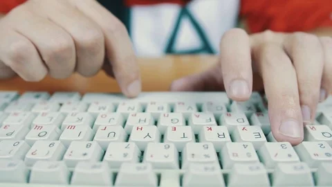 A man playing a computer game by controlling the keyboard. Stock Footage 70170002