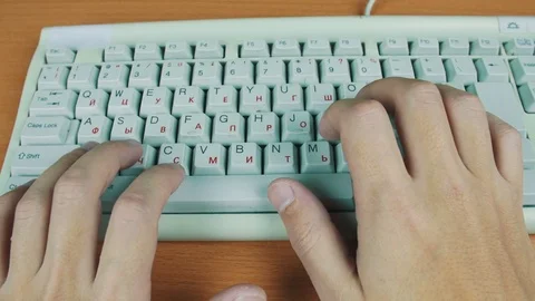 A man playing a computer game by controlling the keyboard. Stock Footage 70170648