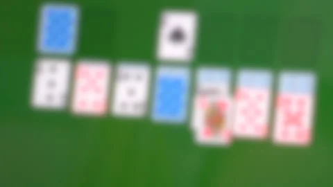 Man playing computer game Solitaire on the monitor computer Stock Footage 132104395