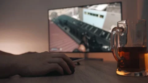 Man Playing Computer Games At Home At Night With A Lamp Stock Footage 147292955