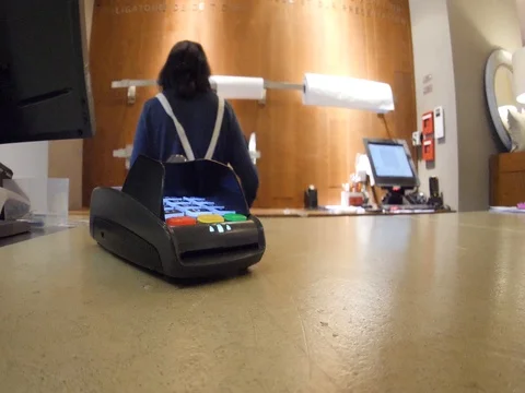 Man playing with the contactless payment card at the card reader Stock-Footage 77558314