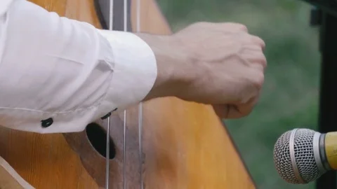 A man playing the contrabass Stock Footage 71197091