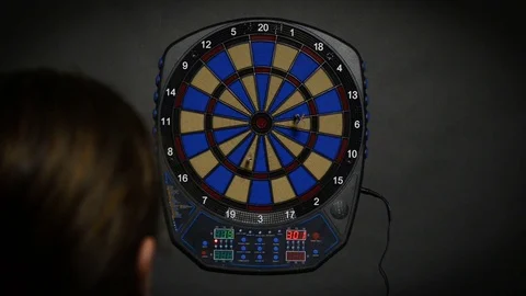 Man playing darts Stock Footage 72070304