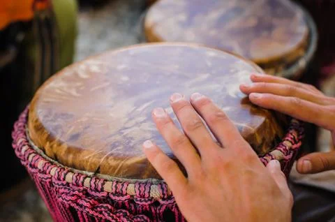 Man playing the djembe Stock Photos