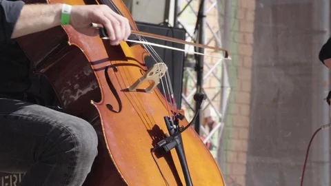 Man playing a double bass during a performance Stock Footage 116036728