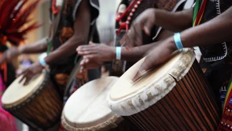 Man playing drum by his hands. Street performance using percussion instruments Stock Footage 151792034