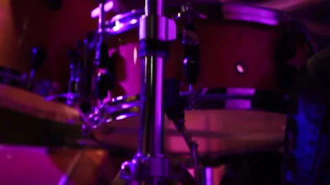 Man playing drum inside building 스톡 동영상 290940124