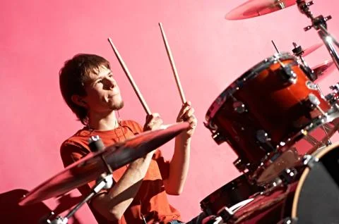 Man playing on drum Stock Photos
