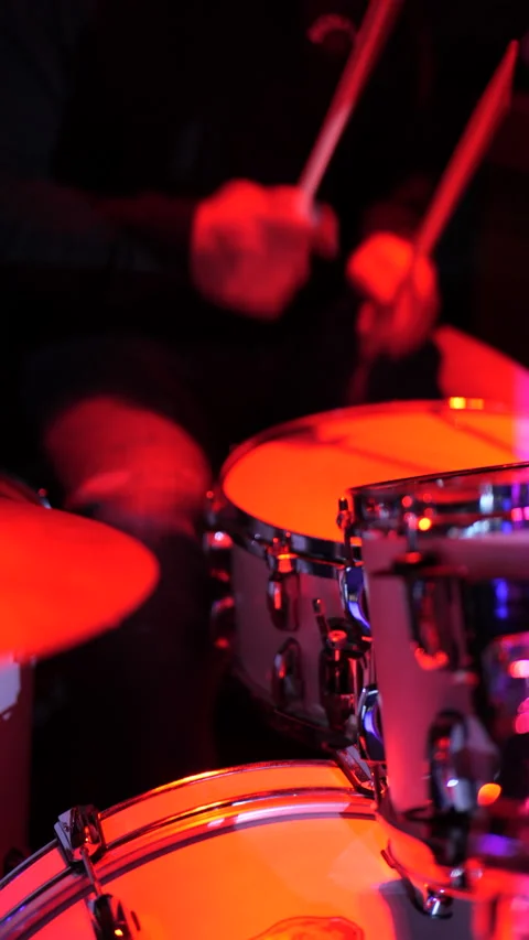 Man playing the drums during a concert, no faces show. Stock Footage 233242541