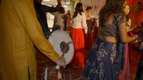 Man playing drums during an Indian wedding party. Video stock 264556458